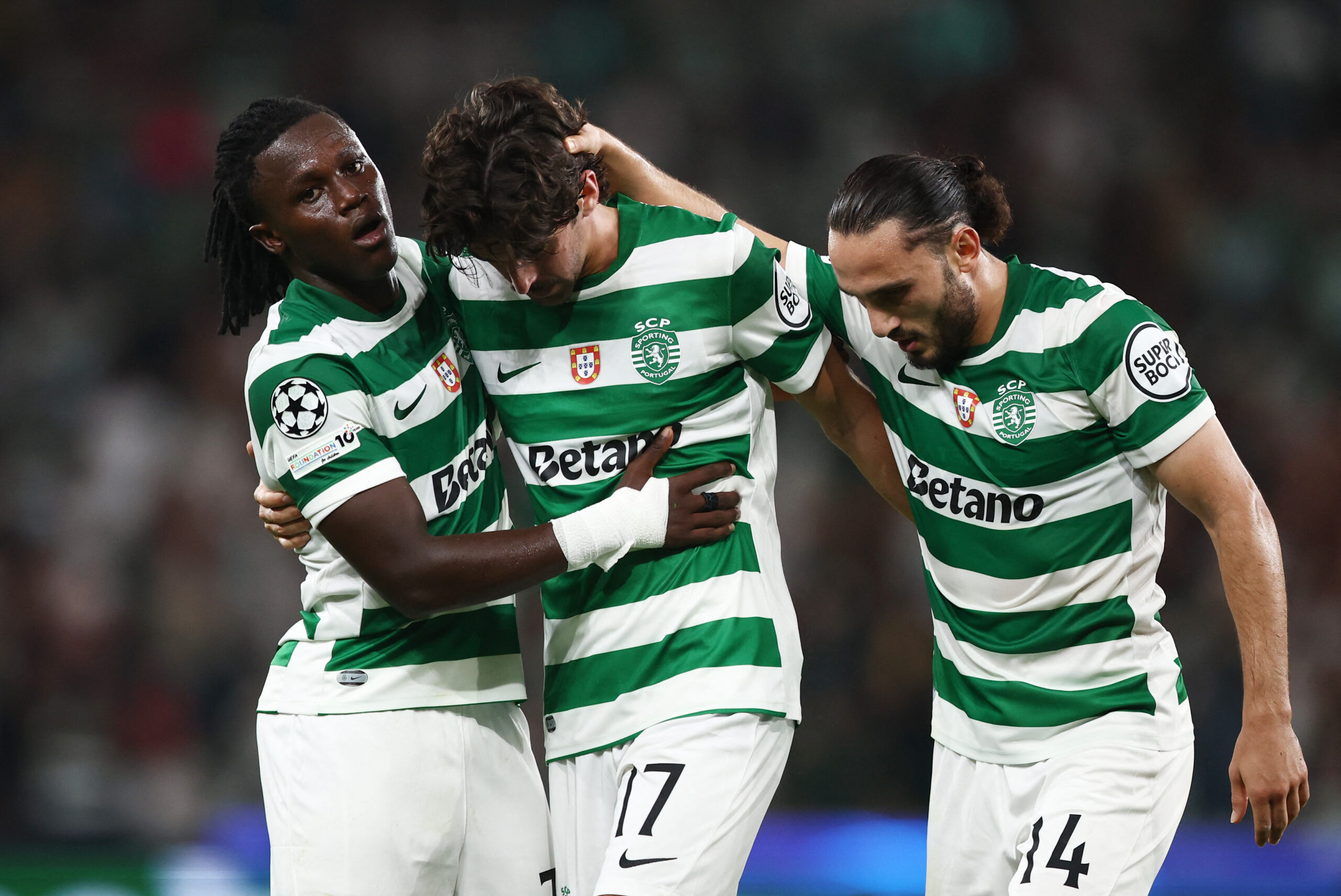 Soccer Football - UEFA Champions League - Sporting CP v Kairat - Estadio Jose Alvalade, Lisbon, Portugal - September 18, 2025 Sporting CP's Francisco Trincao celebrates scoring their first goal with Geovany Quenda and Giorgi Kochorashvili REUTERS