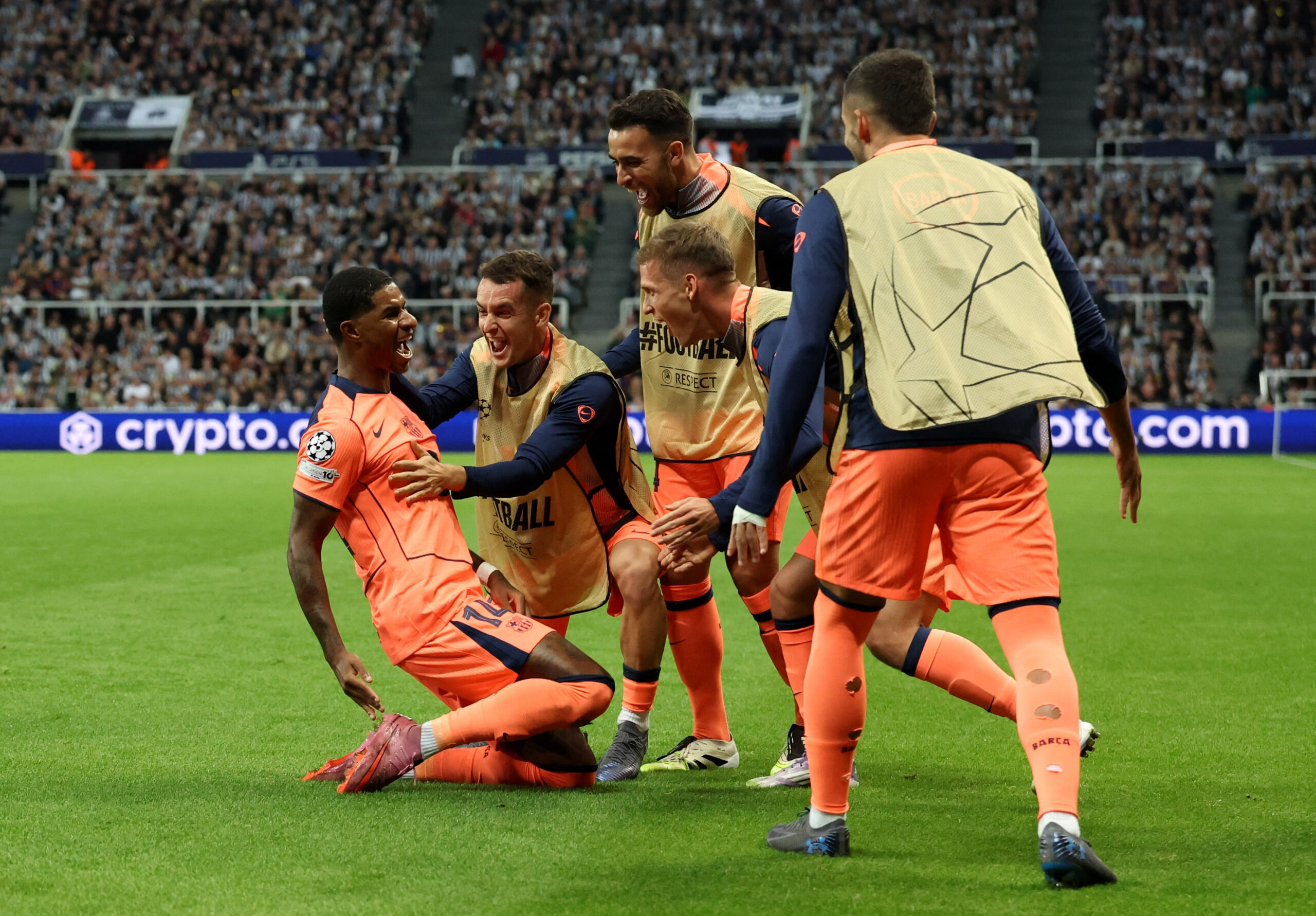Soccer Football - UEFA Champions League - Newcastle United v FC Barcelona - St James' Park, Newcastle, Britain - September 18, 2025 FC Barcelona's Marcus Rashford celebrates scoring their first goal with teammates REUTERS