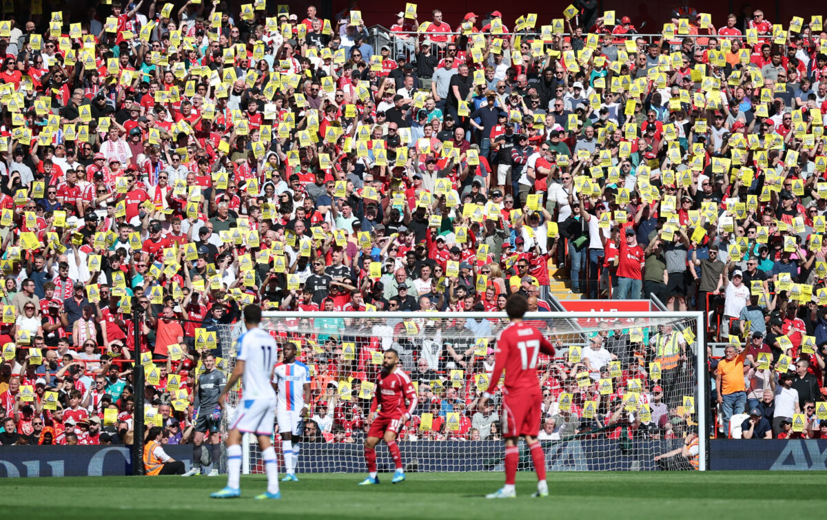 Soccer Football - Premier League - Liverpool v Crystal Palace - Anfield, Liverpool, Britain - April 25, 2026 General view as Liverpool fans hold up yellow cards in protest against the ticket price increase REUTERS