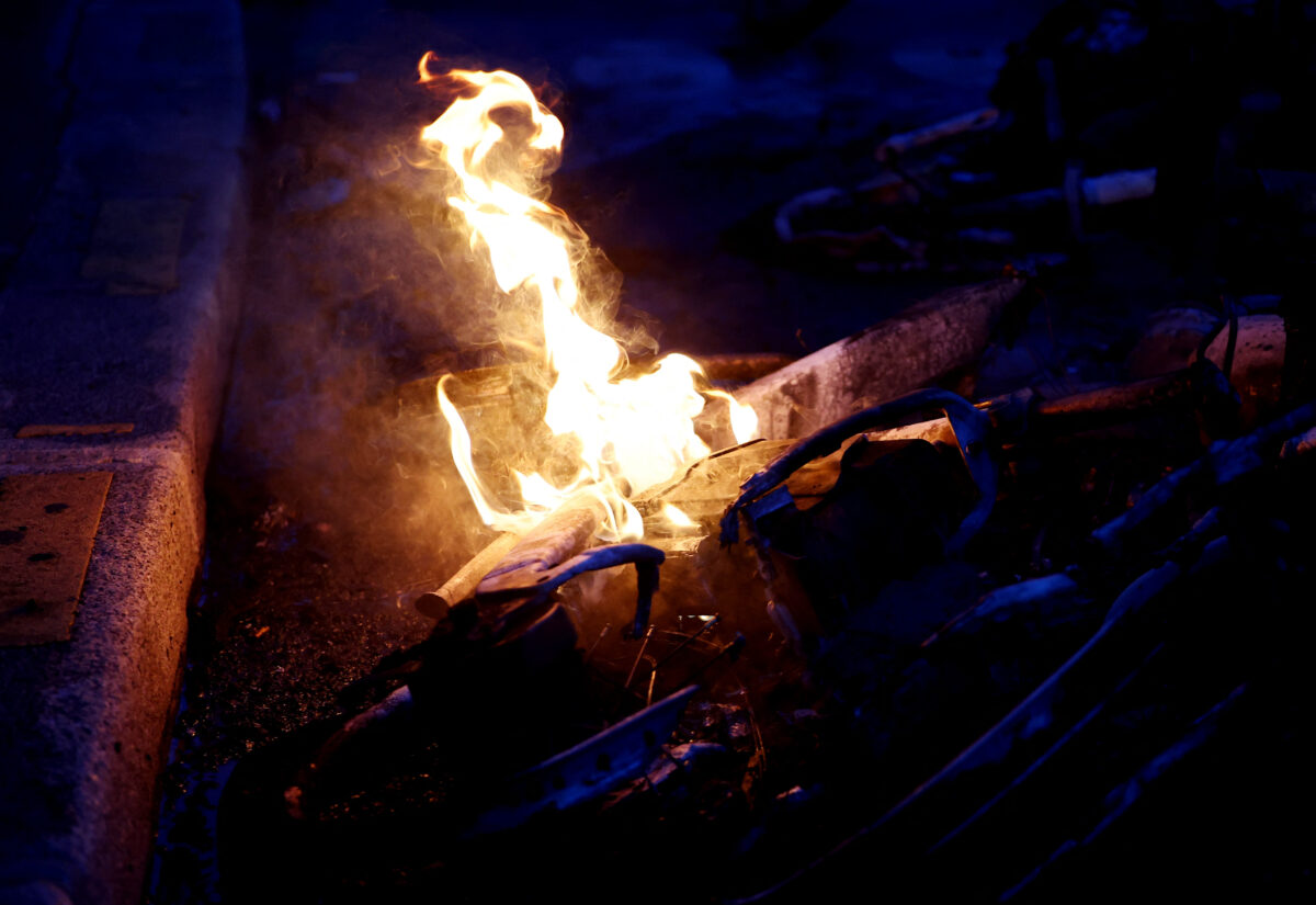 Soccer Football - UEFA Champions League - Paris St Germain fans in Paris watch the Final - Parc des Princes, Paris, France - May 30, 2026 General view of a bike on fire in the streets REUTERS