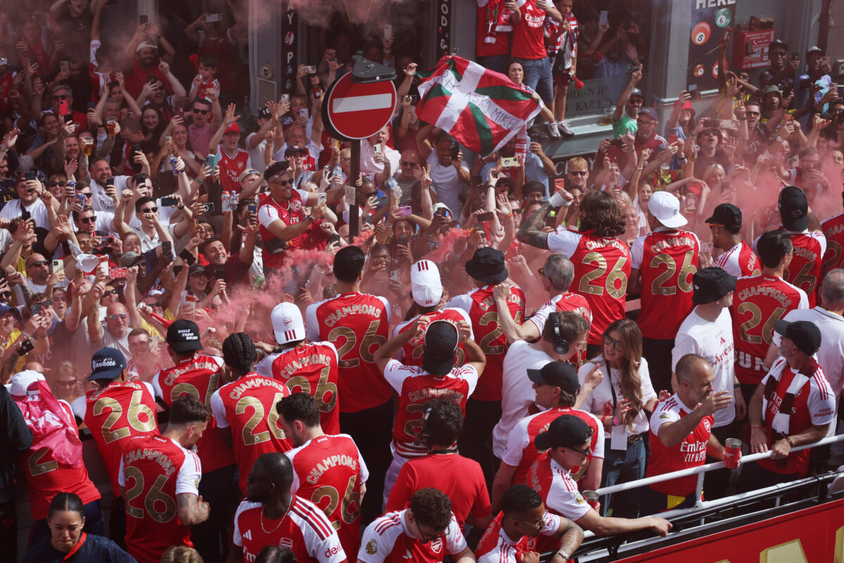 Soccer Football - Premier League - Arsenal Victory Parade - London, Britain - May 31, 2026 Arsenal players celebrate with fans during the victory parade REUTERS